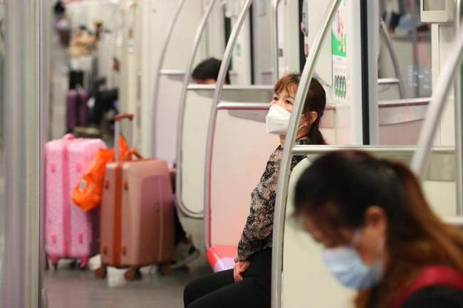 Fotas Zhu Xingxin el China Daily